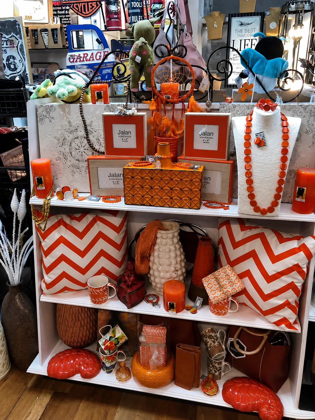 Necklaces, frames and giftware styled on the shop shelves